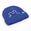 Close-up of blue ribbed knit beanie featuring white embroidered bear and side logo tag - Blue