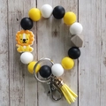 Silicone bead keychain bracelet with yellow lion charm and matching tassel - Lion