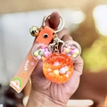 Orange Mickey-shaped liquid quicksand keychain with wish strap and golden bell charm - Orange
