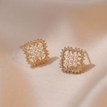 Gold square stud earrings featuring tiny white pearls and micro-pave crystals - Square Pearl Rhinestone Style (E0521)