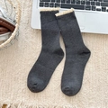 Dark gray ribbed mid-tube socks with beige lace trim on a cozy home aesthetic background - One Size / Dark Gray