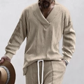 Men's beige knit sweater with V-neck and textured cable knit design in a loose fit - Khaki