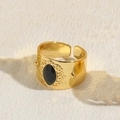 Vintage 14K gold plated ring featuring a black oval gemstone and baroque carvings - Baroque Relief Black Agate / Gold with Black Main Stone