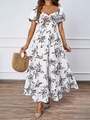 Detail of floral hollow-out off-shoulder summer dress with puff sleeves and tiered hem - S / Black and White Print