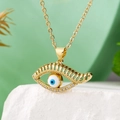 Vergoldete Halskette mit blauem Evil Eye Anhänger und Zirkon auf weißem Stein - Weißer Zirkonia