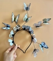 Detail of realistic butterfly headband with colorful blue and yellow winged ornaments - Grey Butterfly Headband (14 Butterflies)