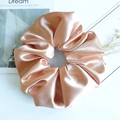Oversized champagne satin scrunchie with elegant silk luster and soft pleated texture - Champagne