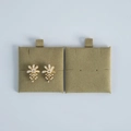 Elegant off-white petal drop earrings with gold accents on velvet display stand - Army Green