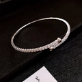 Elegant silver titanium steel bracelet with full pavé cubic zirconia in a crossover design - Style 25 / Silver