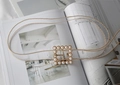 Detail of transparent PVC belt with gold bead chain edges and square pearl buckle - Square Pearl Transparent (Gold Beaded Edge)