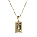 Detail shot of vintage 18k gold plated tarot necklace featuring The Star card with crystals - Star / Steel