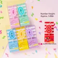 Colorful 3.8cm birthday number candles in pink, blue and purple with white borders - PVC Box Candy Number Candle 0