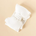 White knitted baby headband featuring a large double-layer DIY yarn bow detail - White