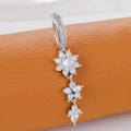 Silver flower belly button ring featuring sparkling white cubic zirconia dangles - Classic Pendant (Silver White)