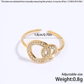 Adjustable golden stainless steel ring featuring double-intertwined bands and white zircon - Intertwined Double Loop / Gold
