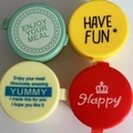 Mini plastic bento sauce bottles in blue, yellow, and red with fun decorative prints - English Round Boxes Set of 4