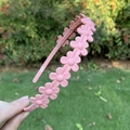 Cerchietto rosa opaco con fiori da donna caratterizzato da un design antiscivolo colorato - Rosa