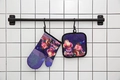 Kitchen oven mitt and pot holder set featuring colorful cartoon gnome print patterns - Cartoon Gnomes