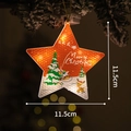 Star-shaped LED Christmas light with reindeer and snowman patterns on a tree - Christmas Star