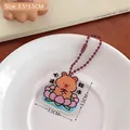 Kawaii acrylic bear keychain with heart design and beaded chain for school bags - Zen Bear