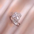 Silver flower ring with micro-pave zircons and leaf design on pink satin background - Silver Necklace / Silver