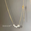 Elegant gold necklace featuring four graduated white pearls on a minimalist chain - X748 Gold - Gradient Four Pearls
