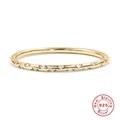 Detailed view of gold plated 925 silver ring featuring shimmering round cut cubic zirconia - Gold Thin White Zirconia Dotted Eternity Ring (Style 9-White)