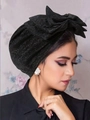 Elegant black turban hat for women featuring a large silver glitter bow decoration - Glitter Black
