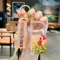 Capybara bus drifting oil keychain with pink strap and strawberry decorative charms - Capybara Bus - Blue