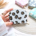 Floral daisy print coin purse in white pebbled leather with secure gold zipper closure - White