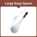Detailed view of a 21.5cm ceramic large soup spoon with a brown handle and hanging hole - 21.5cm Large Soup Spoon / Brown