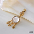 Macro shot of a golden dreamcatcher pendant with moonstone and leaf details - D084 Moonstone Dreamcatcher