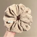 Oversized beige waffle fabric hair scrunchie with floral pattern and brand tag - Apricot Knit Floral Scrunchie