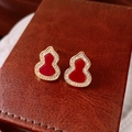 Detailed close-up of a red gourd stud earring with gold plating and white zircon accents - Gourd Shape / Gold-Red