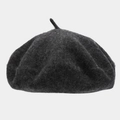 Detailed texture of thick dark grey wool beret showing classic top stem and felt fabric - One Size / Dark Heather Grey