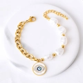 Bracelet chaîne dorée avec perles blanches et pendentif œil porte-bonheur brillant - Œil