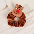 Close-up of brown velvet Christmas scrunchie with 3D reindeer plush decor on white fabric - Christmas Cartoon Scrunchie - Reindeer B