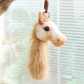 Portachiavi a forma di testa di pony in peluche crema e marrone con cordino intrecciato - Beige
