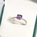 Elegant silver ring featuring a cushion-cut purple gemstone with micro-paved zircon stones - Purple Cushion Cut Gemstone Four-Prong Style (白金色10)