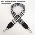 Detail of houndstooth strap with black leather connectors and silver metal swivel hooks - Black White + Black Leather + Silver Hook