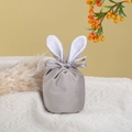 Detail of grey velvet Easter bunny ear gift bag with a silk ribbon bow on white fabric - Large / Light Gray