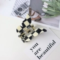 Butterfly hair claw clip featuring black and white checkerboard pattern in acrylic - Beige and Black Checkerboard
