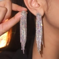 Sparkling long tassel rhinestone earrings with AB crystals on a model for a luxury look - 3D Style / Silver AB Rhinestone
