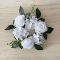 Handmade white artificial rose wreath candle ring with green leaves on wood surface - Pure White