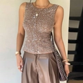 Detail view of the shimmering champagne gold sequins on a slim fit sleeveless top - S / Brown