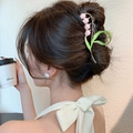Pink tulip lily of the valley hair claw clip worn by a model for elegant styling - Lotus Pink Lily of the Valley-YZAP45-5