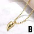 Collier avec pendentif dent de loup dorée sur chaîne à billes au style hip-hop raffiné - Croc de loup / Or