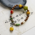 Handmade ceramic beaded bracelet with star pendants and colorful rustic wood beads - 939B Yunchuan