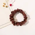 Close-up of dark brown satin scrunchie featuring high-gloss silk texture and elegant pleats - Satin Thin Scrunchie-Dark Coffee