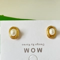Elegant oval freshwater pearl earrings with retro golden base on white display card - Retro Gold Alloy Border Oval Pearl